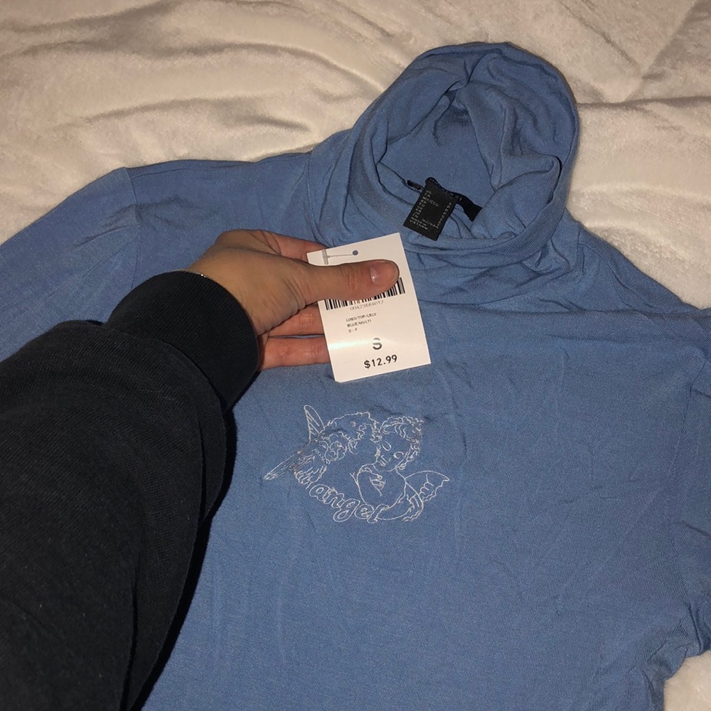 Baby blue angel turtle neck top